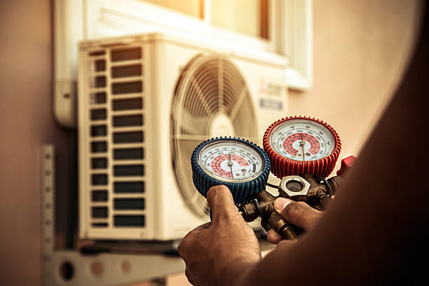 Professional Air Conditioning Service technician working in Kinzers, PA